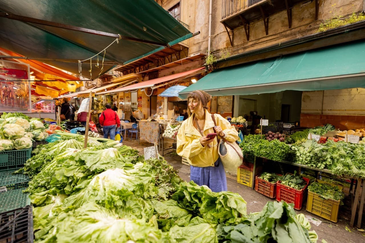 Glass wall in modern architecture with landscape visible through clear panels